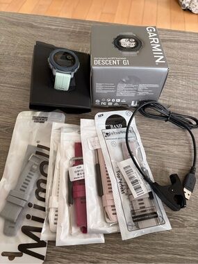 Garmin Descent G1 Smartwatch — Mint Green and Black